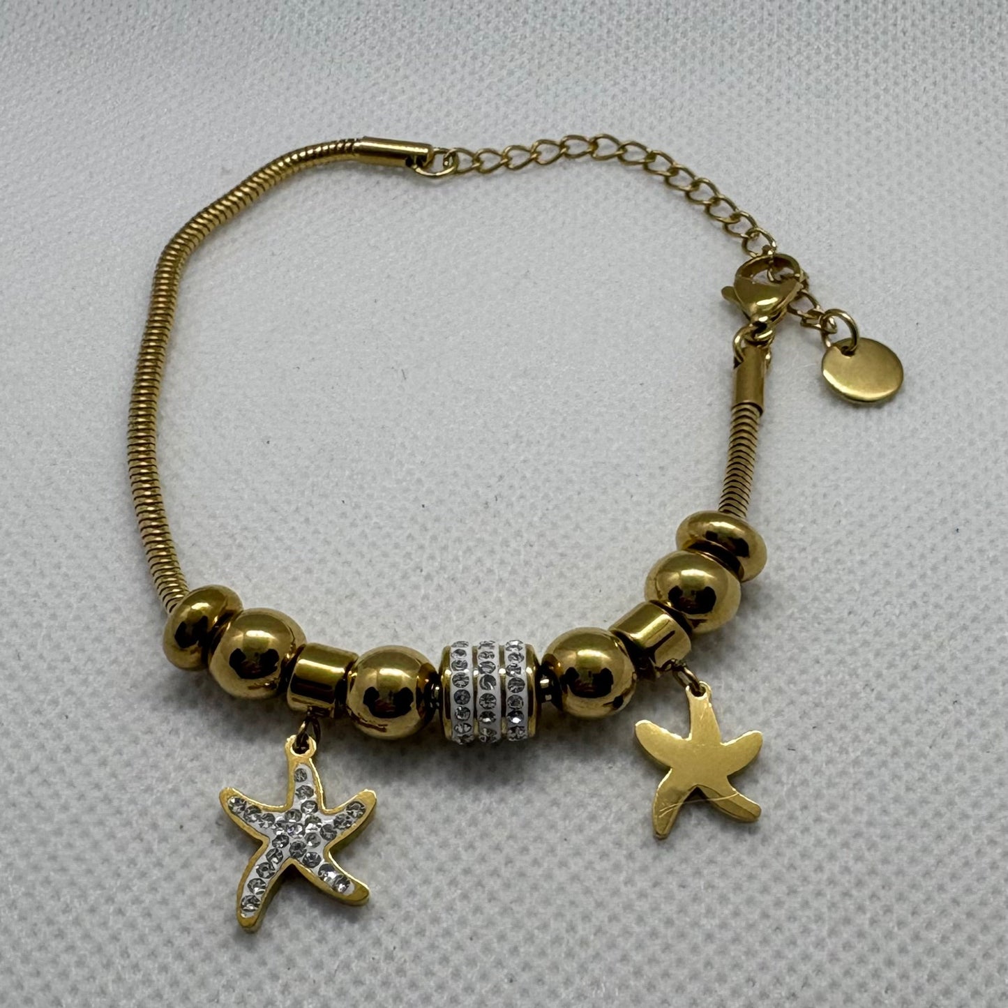 Pulsera acero dorada playa